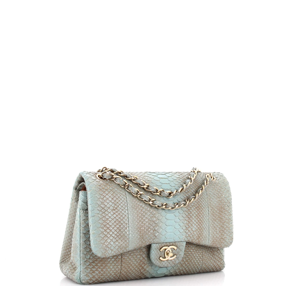 Chanel Classic Double Flap Bag Python Jumbo: Certain creations transcend their era to become permanent fixtures. Rendered in Python, this Chanel silhouette has anchored collections and turned heads since its debut. Presented in python constructi