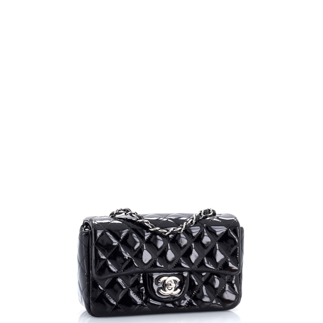 Chanel Classic Single Flap Bag Quilted Patent Mini: A standing ovation in accessory form. The Chanel Classic Single Flap Bag Quilted in Black Patent is not asking for permission -- it is making a statement. Presented in the Mini size, patent constructi