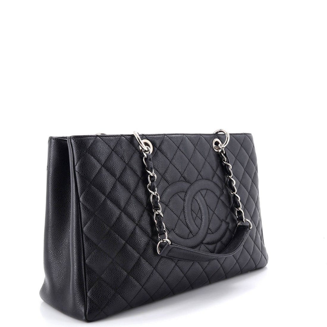Chanel Grand Shopping Tote Quilted Caviar XL: The dress code says formal. This piece says fabulous. This Chanel Grand Shopping Tote does not follow trends. Trends follow it. Presented in the XL size, quilted caviar construction, a black colorway.