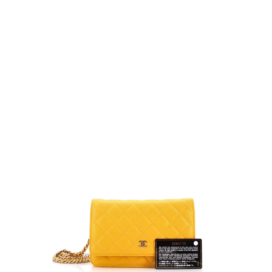 Chanel Wallet on Chain Quilted Caviar: Like a love letter folded into leather and light. This Chanel Wallet on Chain has the kind of beauty that deepens on second glance. Presented in quilted caviar construction, a yellow colorway. Approxi