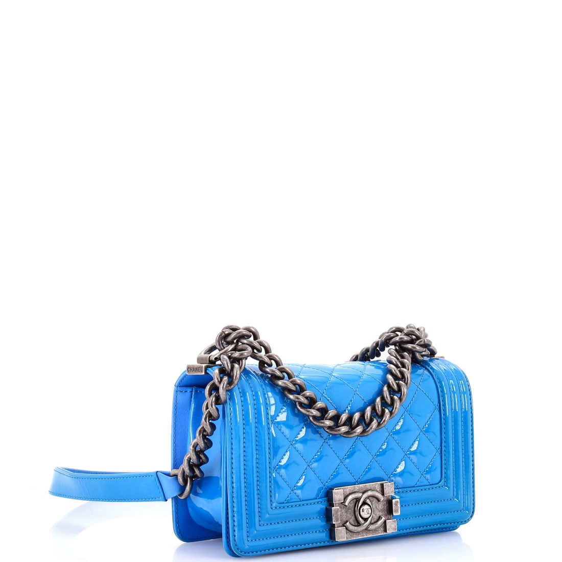 Chanel Boy Flap Bag Quilted Patent Small: There is poetry in the way the hardware catches the sun. In Blue, the Chanel Boy Flap Bag Quilted becomes something almost atmospheric -- present but never insistent. Presented in the Small size, pate