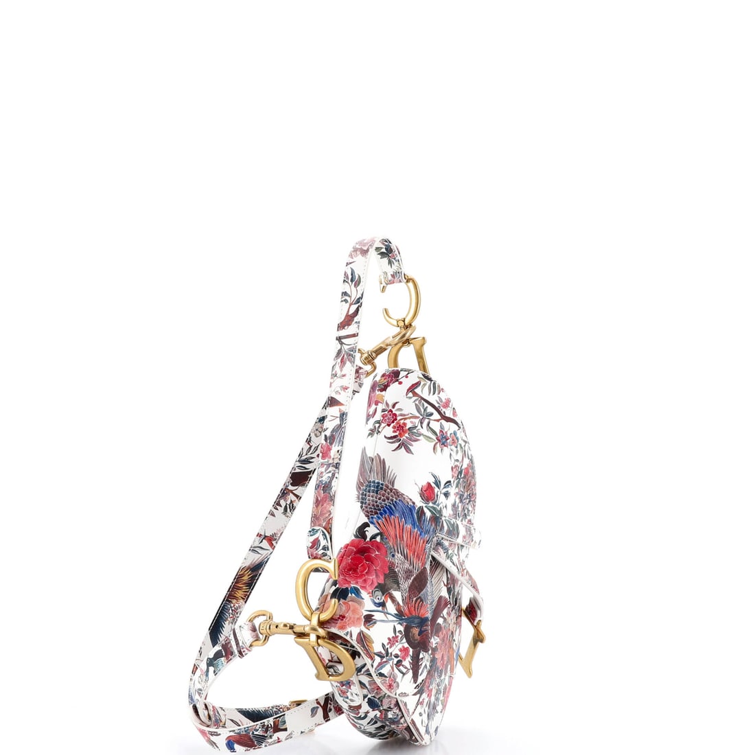 Christian Dior Saddle Handbag with Strap Printed Leather Medium: Not everything from the maison becomes a classic; this one did. In Print, White, the Saddle Handbag with Strap Printed takes on a dimension that speaks to Christian Dior's mastery of palette. Presente