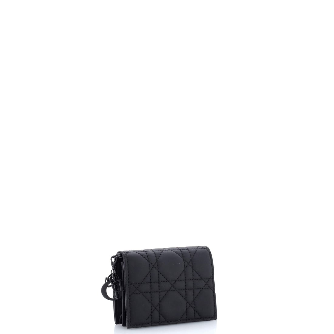 Christian Dior Ultra Matte Lady Dior Flap Card Case Cannage Quilt Calfskin: For the collector of quiet moments and beautiful things. The Ultra Matte Lady Dior Flap Card Case Cannage Quilt in this particular shade of Black carries an almost meditative elegance. Presented in ca