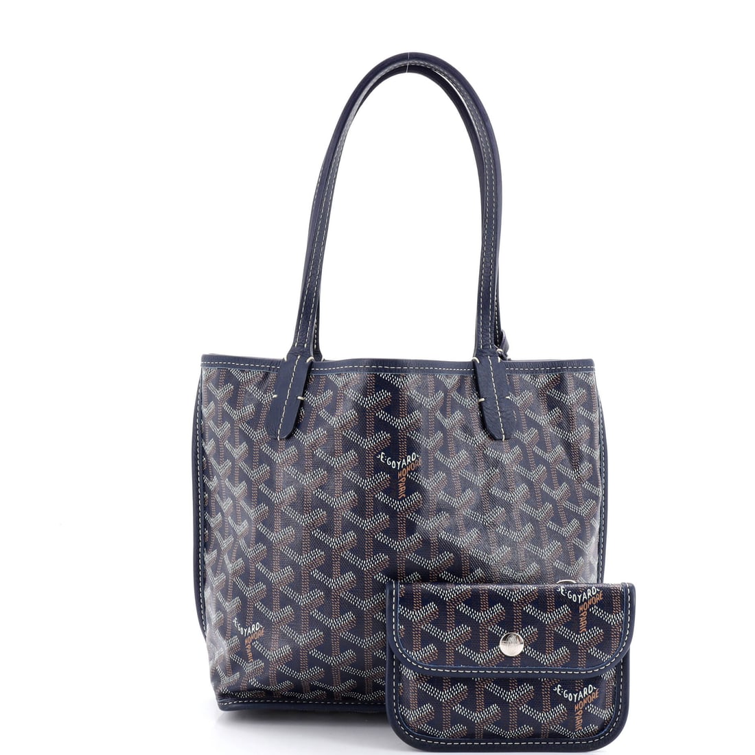 Goyard Anjou Reversible Tote Coated Canvas Mini: Not for the wallflowers, and absolutely not for the indecisive. Goyard went all in on this Anjou Reversible Tote, and the result speaks for itself. Presented in the Mini size, coated canvas constructi