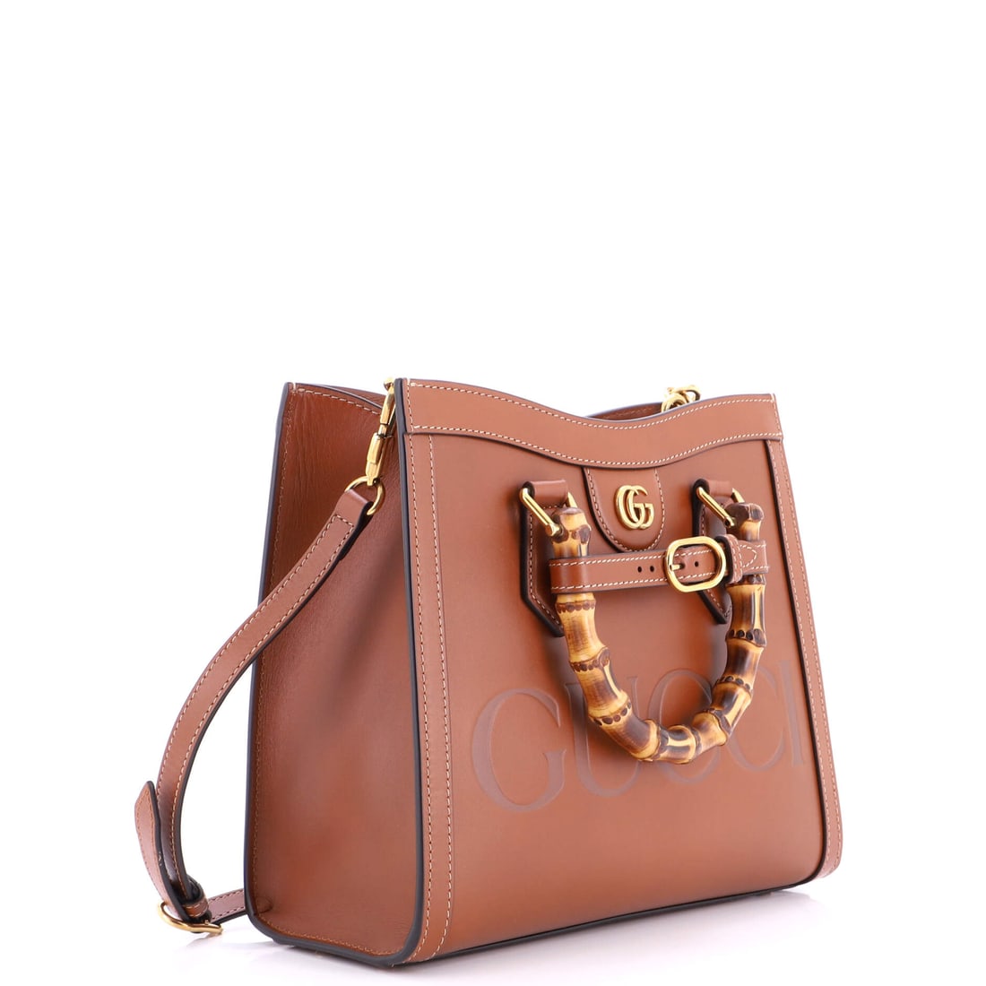 Gucci Diana NM Logo Bamboo Handle Tote Embossed Leather Small: A meditation on form wrapped in the finest materials. This is Gucci at their most poetic -- restrained, resonant, and effortlessly refined. Presented in the Small size, leather construction, a brown c