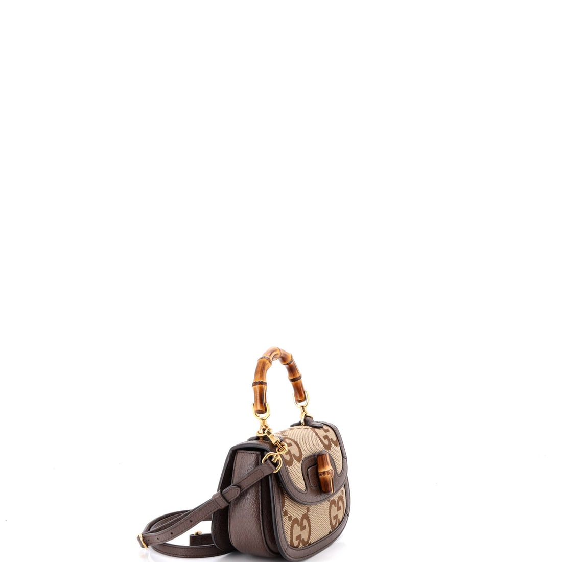 Gucci Bamboo 1947 Top Handle Bag Jumbo GG Canvas Mini: Certain creations transcend their era to become permanent fixtures. The Brown GG Canvas finish elevates an already iconic Gucci silhouette to collector status. Presented in the Mini size, gg canvas co