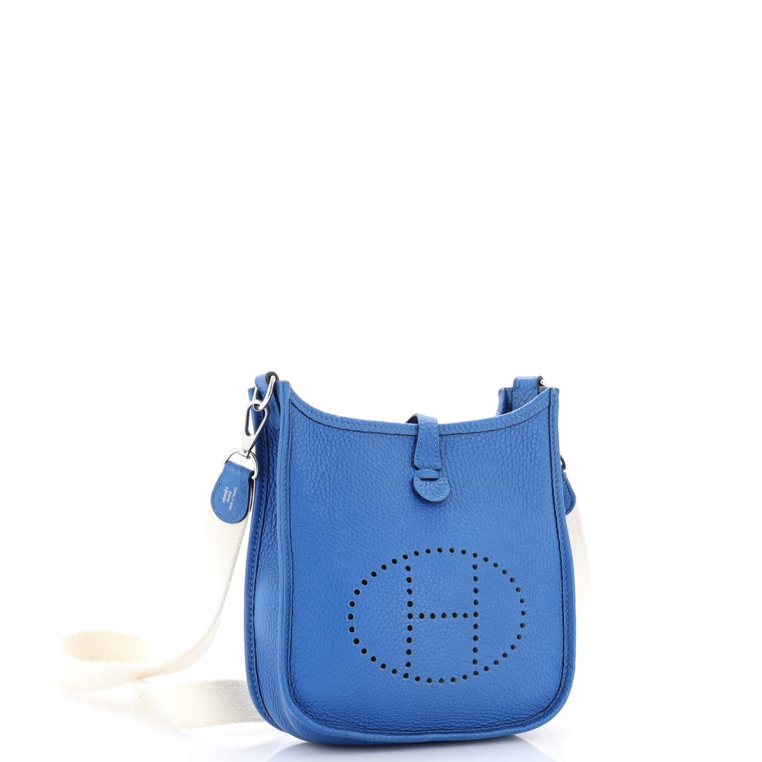 Hermes Evelyne Bag Gen III Clemence TPM: For the collector of quiet moments and beautiful things. In Blue, the Hermes Evelyne Bag Gen III Clemence TPM becomes something almost atmospheric -- present but never insistent. Presented in a blue c