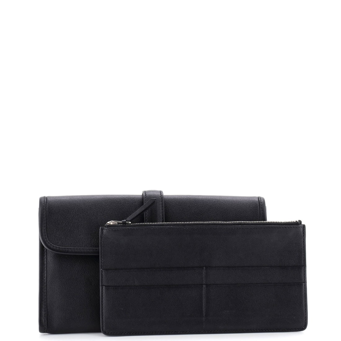 Hermes Jige Duo Clutch Swift: There is bold, there is daring, and then there is this. Hermes went all in on this Jige Duo Clutch Swift, and the result speaks for itself. Presented in a black colorway. Approximate dimensions are 5.