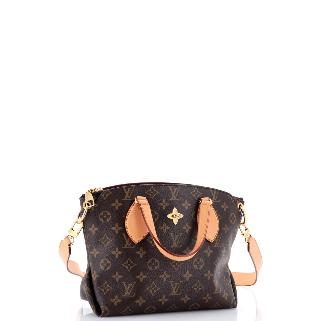Louis Vuitton Flower Zipped Tote Monogram Canvas PM: There is bold, there is daring, and then there is this. In Brown, the Flower Zipped Tote hits different -- bolder, sharper, more definitively Louis Vuitton. Presented in the PM size, monogram canvas c