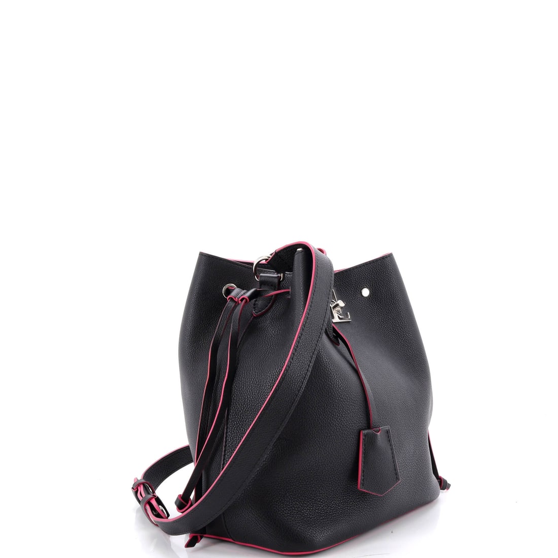 Louis Vuitton Lockme Bucket Bag Leather: The story of this piece begins where mass production ends. Every element of this Lockme Bucket Bag reflects the maison's century-spanning commitment to excellence. Presented in leather construction, a