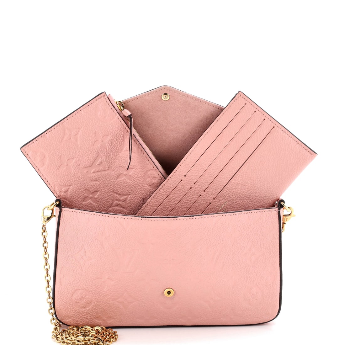 Louis Vuitton Felicie Pochette Monogram Empreinte Leather: If a room needs an entrance, this is how you make one. The Felicie Pochette Monogram is the kind of Louis Vuitton piece that starts conversations and finishes arguments. Presented in empreinte leather