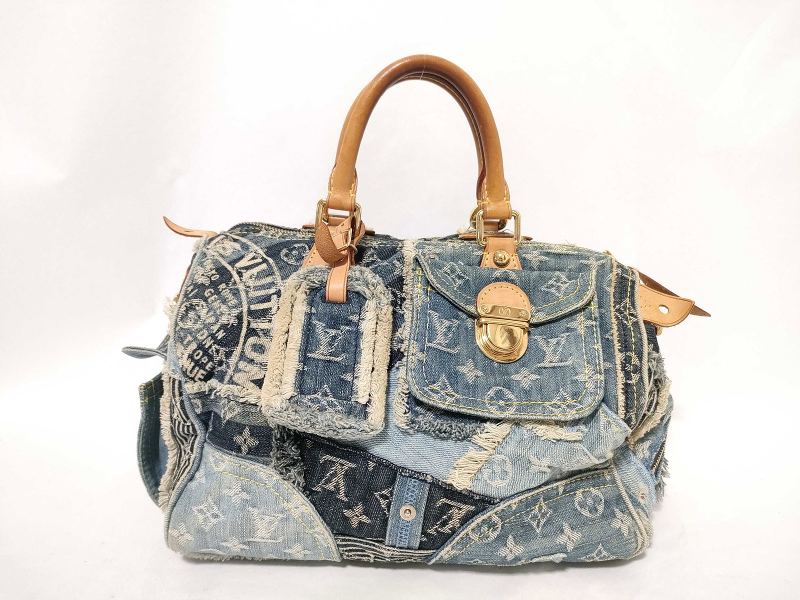 Louis Vuitton Speedy 30, Monogram Denim Patchwork: Patchwork denim, peak Y2K nostalgia. This size-30 Speedy leans into texture and contrast, giving a classic LV shape a street-style twist. It turns 'vintage' into a conversation starter.