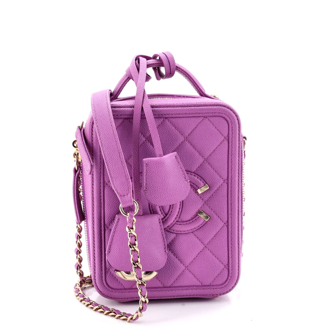 Chanel Filigree Vertical Vanity Case: The lineage of Chanel's handbag craft is evident in every detail. The refined Quilted Caviar carries iconic hardware and pristine construction, a hallmark of Chanel's uncompromising standards. A timel