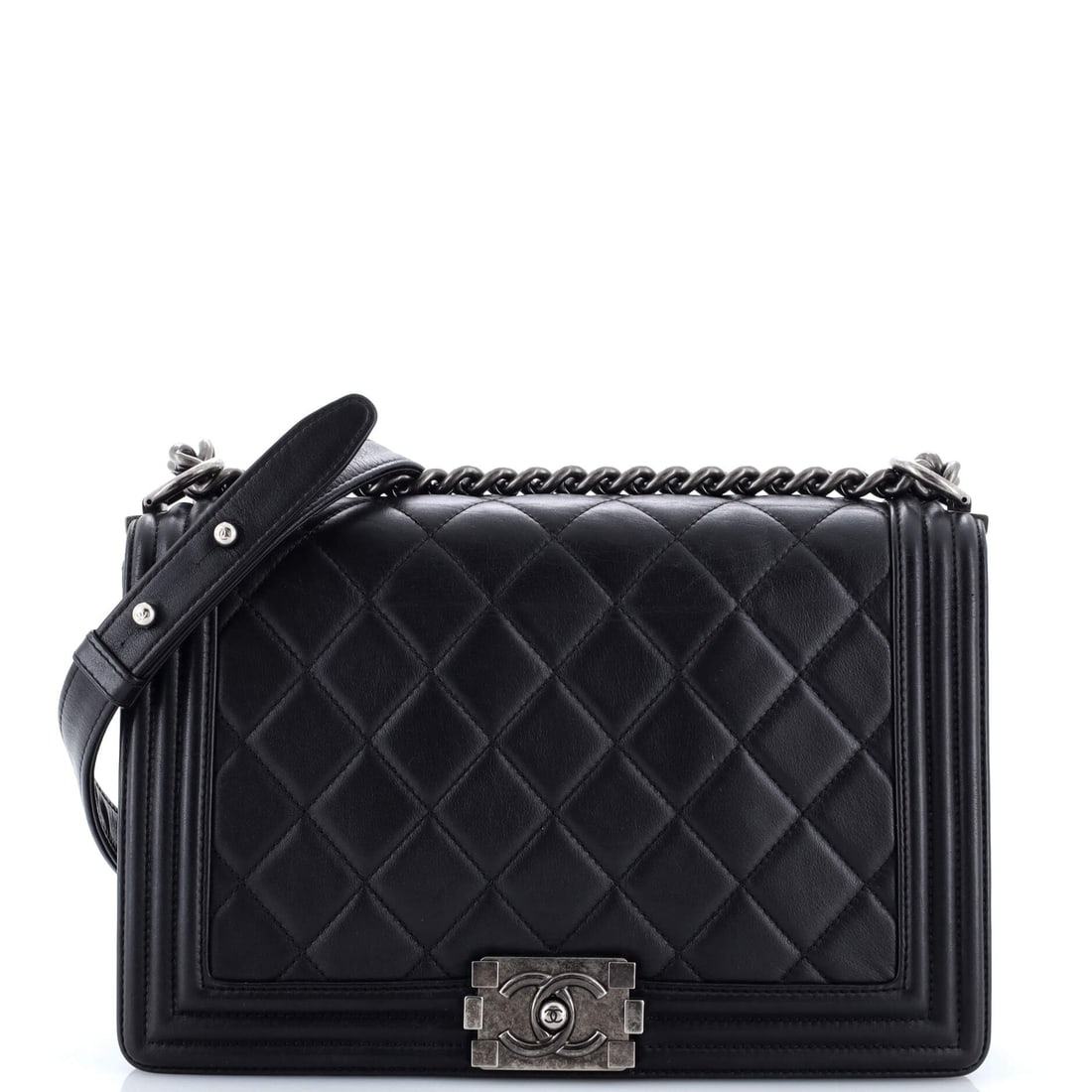 Chanel Boy Flap Bag: This Chanel creation refuses to be overlooked. Showcasing precise stitching throughout in pristine quilted calfskin. Pure luxury theater.
