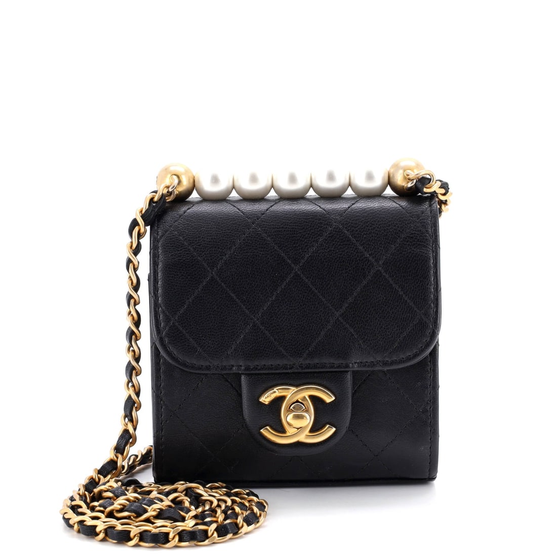 Chanel Chic Pearls Flap Clutch with Chain: Graceful and glorious, this Chanel gem glimmers with grandeur. Wreathed in Italian leather and woven with precise stitching throughout. A symphony of sophistication.