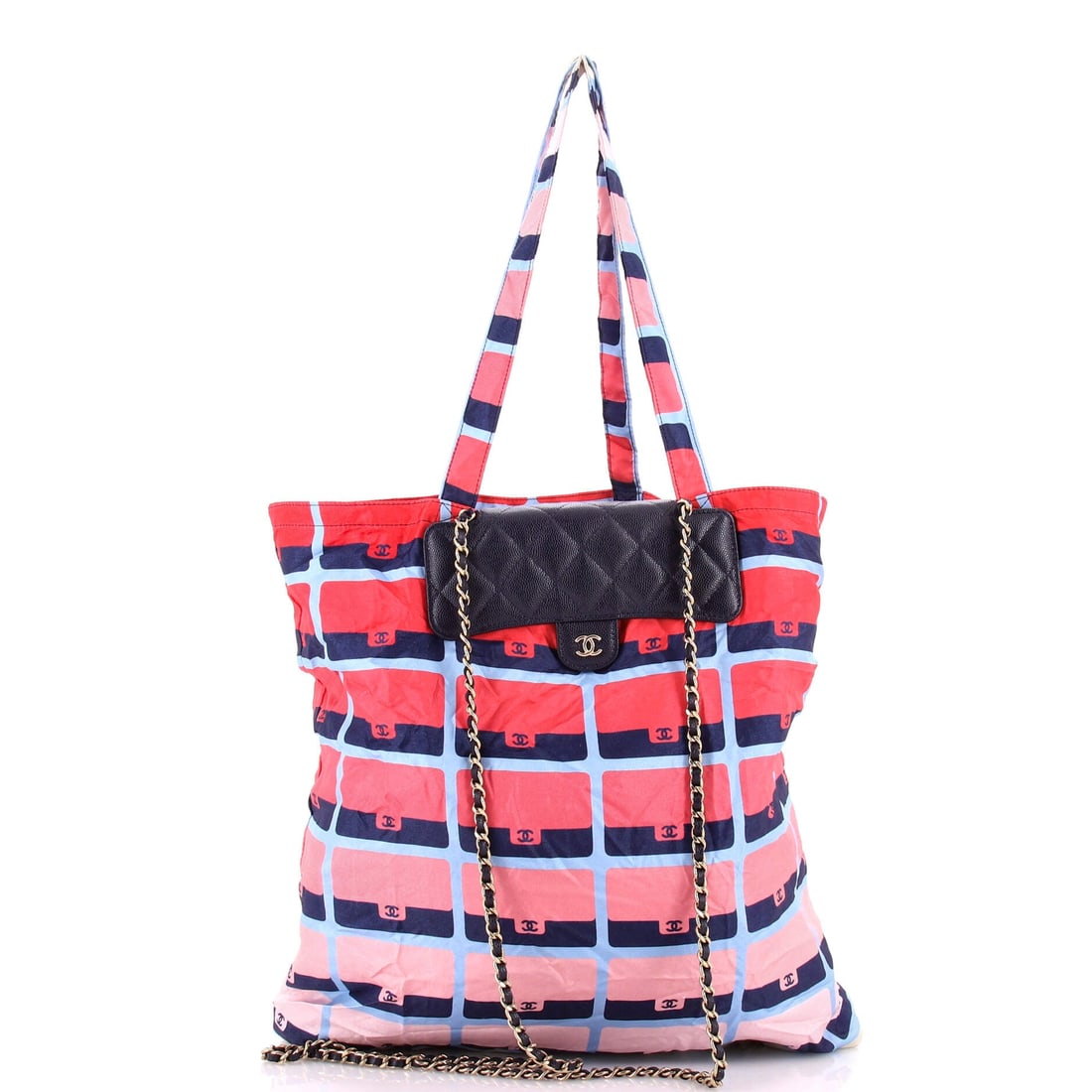 Chanel Foldable Tote Bag with Chain: An evolution of Chanel's pioneering heritage, this handbag speaks to generations of expertise. The Quilted Caviar with Printed Nylon silhouette is rendered in supple signature coated canvas, with scul