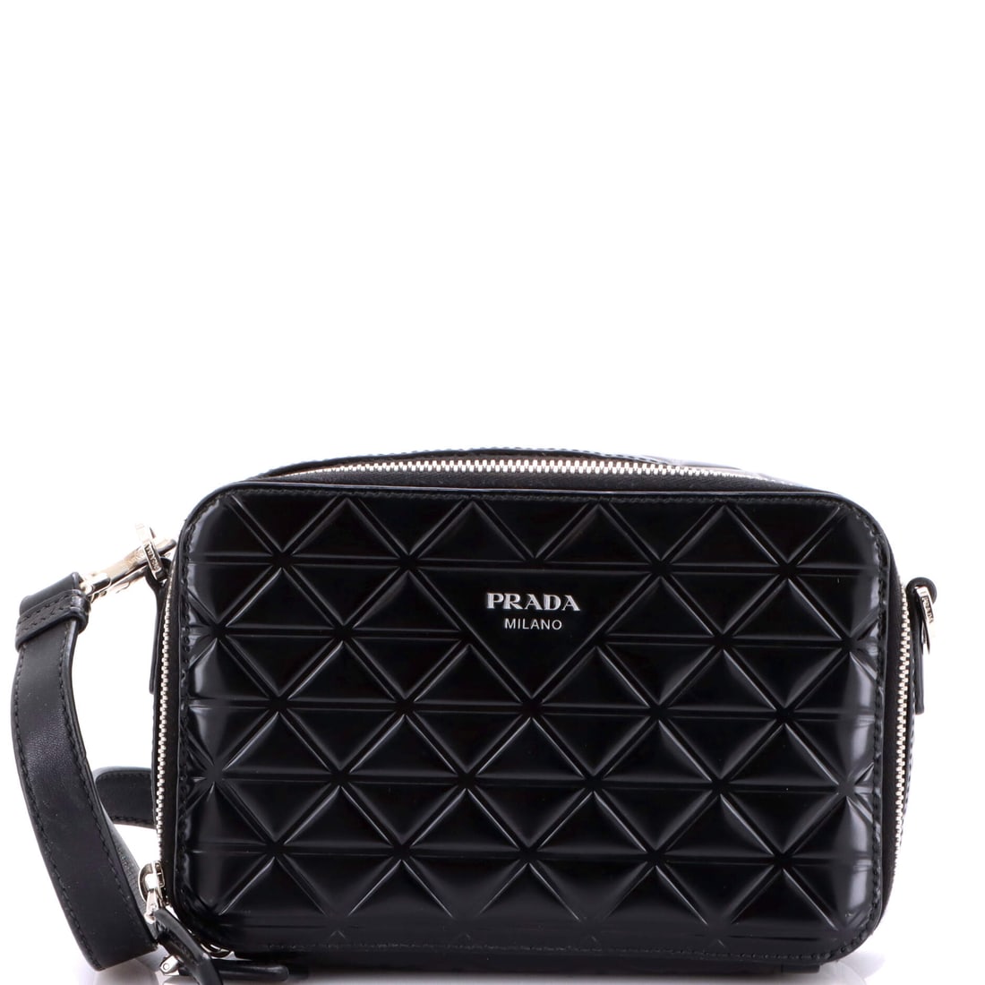 Prada Brique Camera Crossbody Bag Embossed Leather: Heritage does not shout; it simply endures. This Embossed Leather Prada Brique Camera Crossbody Bag is a testament to that truth. rendered in Embossed Leather. It accompanies a life where elegance is 