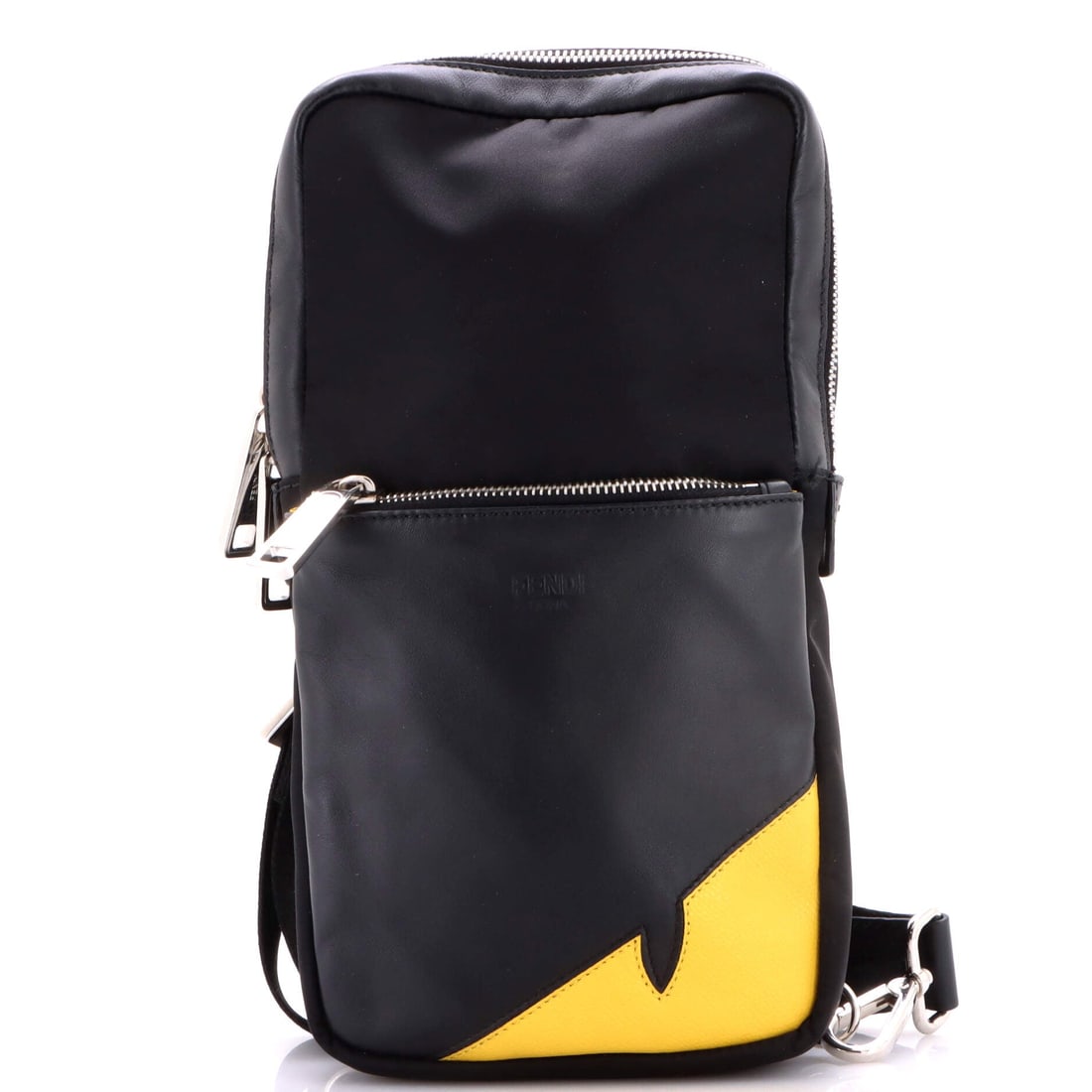 Fendi Monster Sling Bag Nylon and Leather Medium: Style without ceremony -- the Nylon and Leather Fendi Monster Sling Bag gets it right every time. Presented in size Medium, rendered in Nylon and Leather. Designed to keep pace with a schedule that do