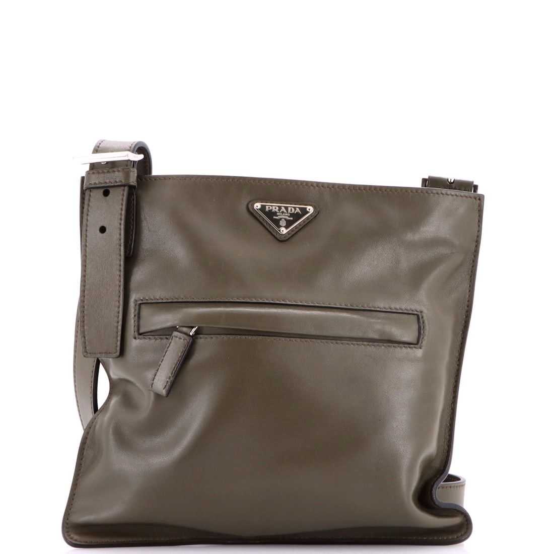 Prada Front Pocket Messenger Bag Soft Calfskin Medium: Few pieces carry the weight of their maison as gracefully as this Soft Calfskin Prada Front Pocket Messenger Bag -- a study in enduring design. Presented in size Medium, rendered in Soft Calfskin. A p