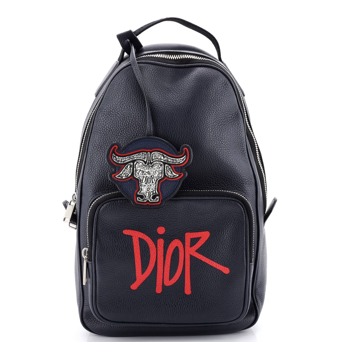 Christian Dior Shawn Stussy Crossbody Backpack Printed Leather: Some designs are not invented but revealed, refined over decades; this Printed Leather Christian Dior Shawn Stussy Crossbody Backpack belongs to that rare tradition. rendered in Printed Leather. For t