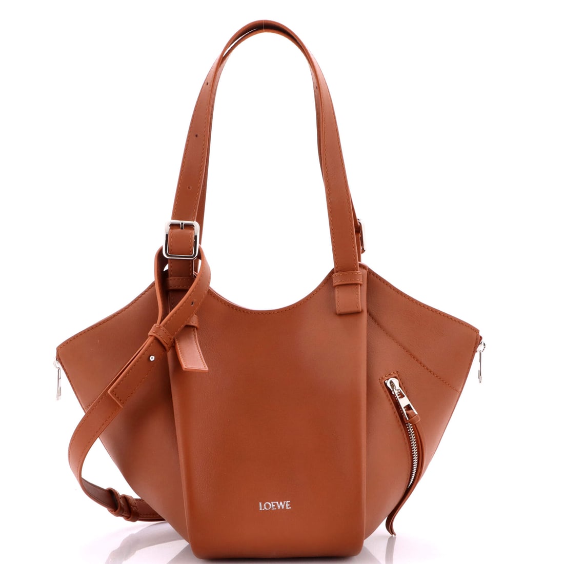 Loewe Hammock Flip Tote Bag, Leather: From the archive to the everyday, the Loewe Hammock Flip Tote Bag in Leather bridges the maison's past tense and its present. A companion for those fluent in restraint, offering presence without the n