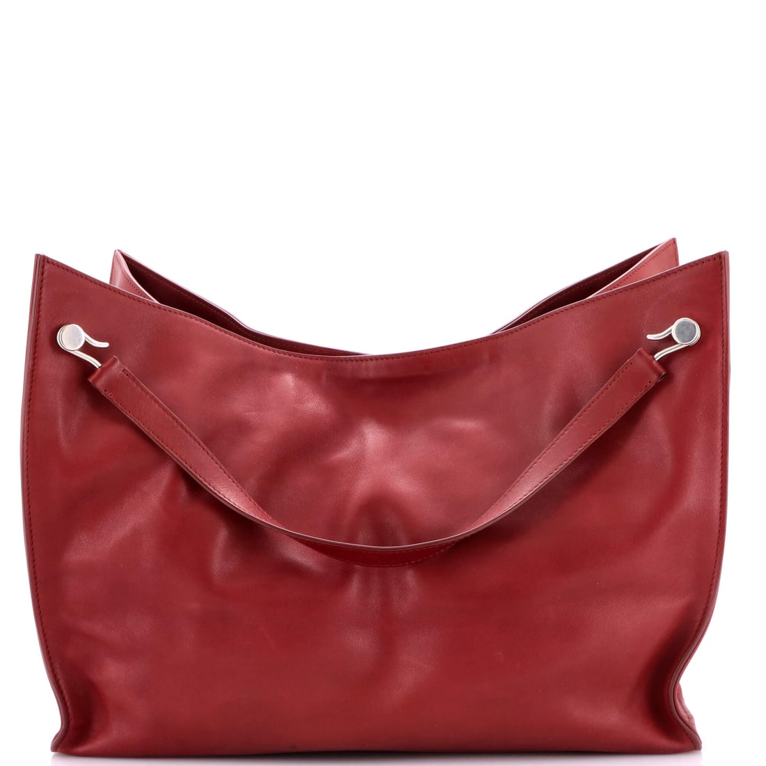 The Row Alexia Tote, Leather, Medium: Composed in proportions that flatter and finishes that hold up, the The Row Alexia Tote in Leather (Medium) is everyday luxury done correctly. Sized for the way you actually move through the day. Dura