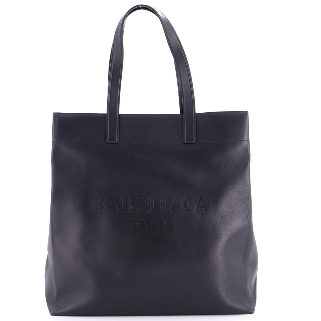 Balenciaga Duty Free Tote, Leather, North South: A study in stillness, the Balenciaga Duty Free Tote in Leather (North South) carries a quiet kind of beauty that lingers. An accessory that accompanies ambition as gracefully as it does leisure. A tho