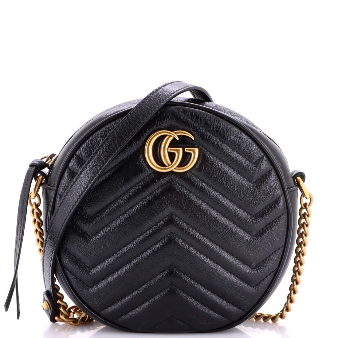 Gucci GG Marmont Round Shoulder Bag, Matelasse Leather, Mini: Restraint is its own form of confidence, and the Gucci GG Marmont Round Shoulder Bag in Matelasse Leather (Mini) embodies it without lifting a brow. It belongs to a wardrobe edited by intention rather