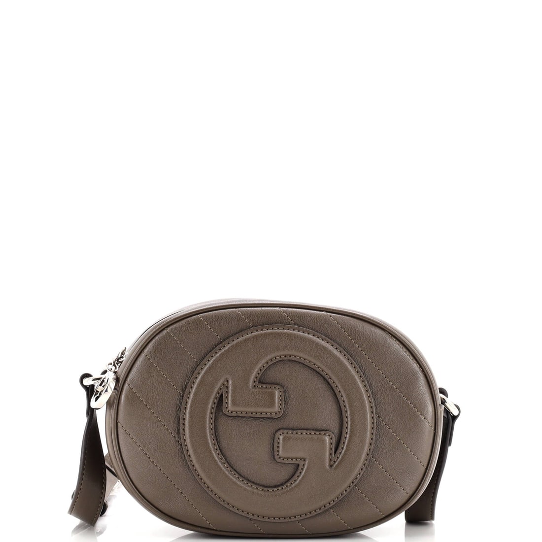 Gucci Blondie NM Round Camera Bag, Diagonal Quilted Leather: Steeped in the history of its maison, the Gucci Blondie NM Round Camera Bag in Diagonal Quilted Leather reflects the kind of craftsmanship that needs no introduction. It belongs to a wardrobe edited b
