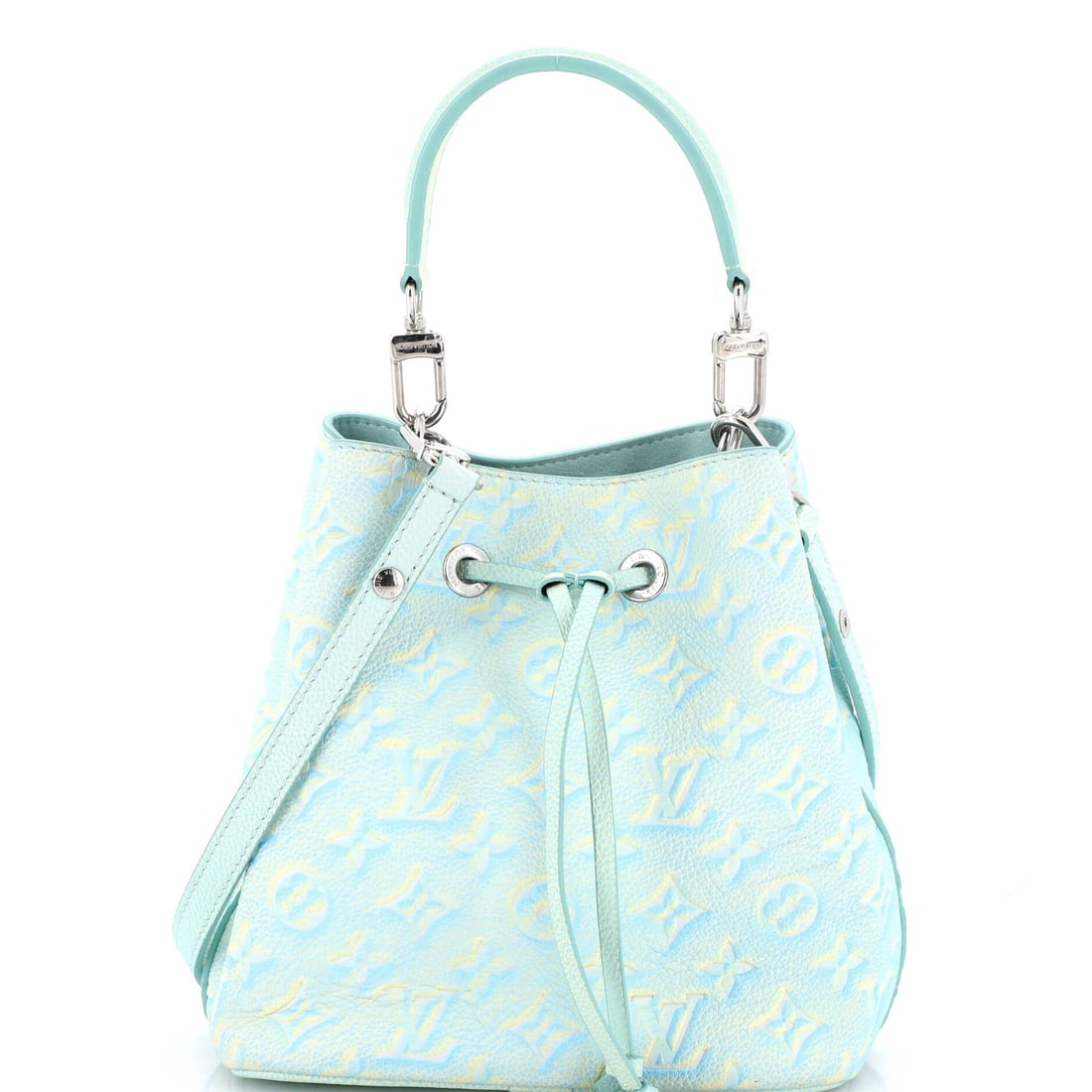 Louis Vuitton NeoNoe Handbag Stardust Monogram Empreinte Leather (BB): The Louis Vuitton NeoNoe Handbag in Stardust Monogram Empreinte Leather occupies the part of the Louis Vuitton catalogue that wardrobes return to season after season, at a 8 by 8 by 5 inch profile. Em
