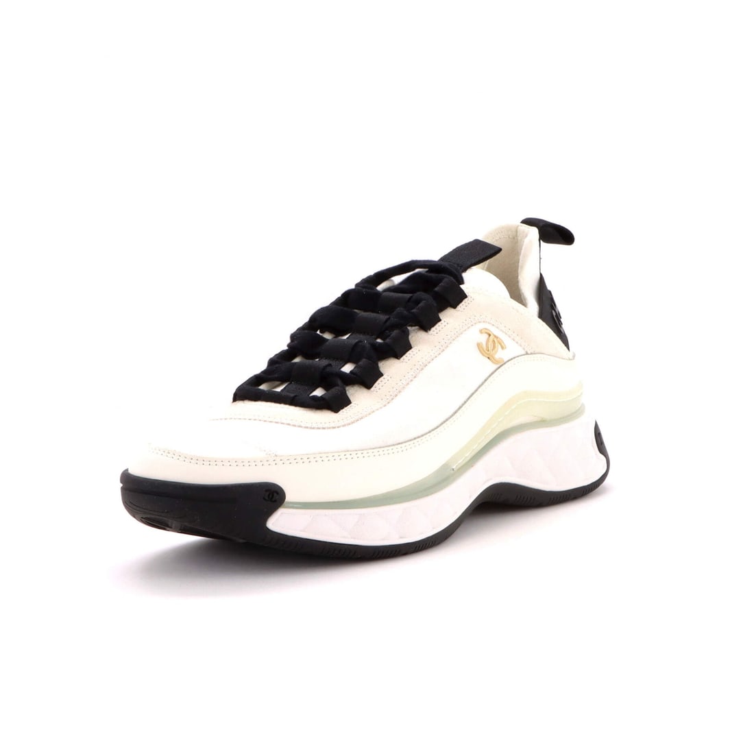 Chanel Women's CC Cap Toe Logo Sneakers Suede and Mixed Fibers (US(W) 10 | IT 40): The Chanel Women's CC Cap Toe Logo Sneakers in Suede and Mixed Fibers translates the model into its most photographed configuration in size US(W) 10 | IT 40. The suede and mixed fibers upper takes lig