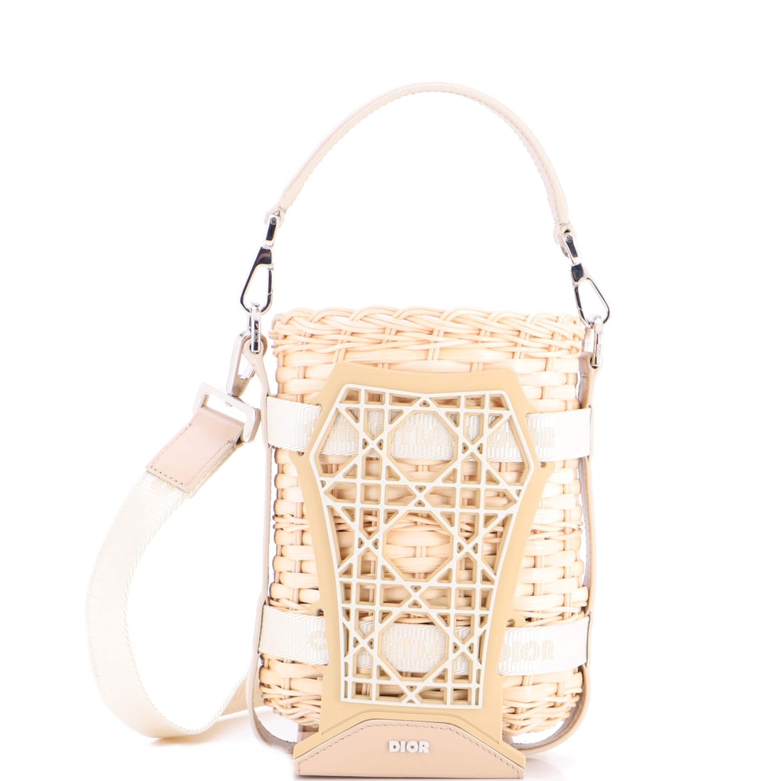 Christian Dior Sahara Basket Bag Wicker Raffia with Leather (5"W x 7"H x 3.5"D): At a 5 by 7 by 3.5 inch profile, the Christian Dior Sahara Basket Bag in Wicker Raffia with Leather offers the silhouette in its most photographed proportion. Wicker Raffia with Leather sits in the de