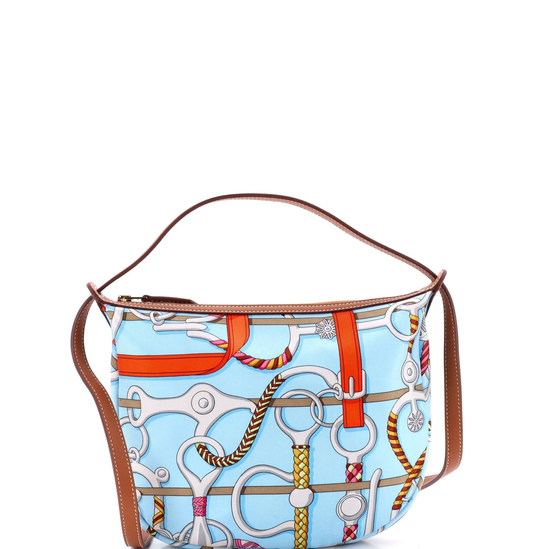 Hermes Sursoie To Go Pouch Printed Silk and Leather (9"W x 7"H x 1"D): The Hermes Sursoie To Go Pouch in Printed Silk and Leather is the model in its boutique-floor configuration, at a 9 by 7 by 1 inch profile. The printed silk and leather finish photographs evenly acros