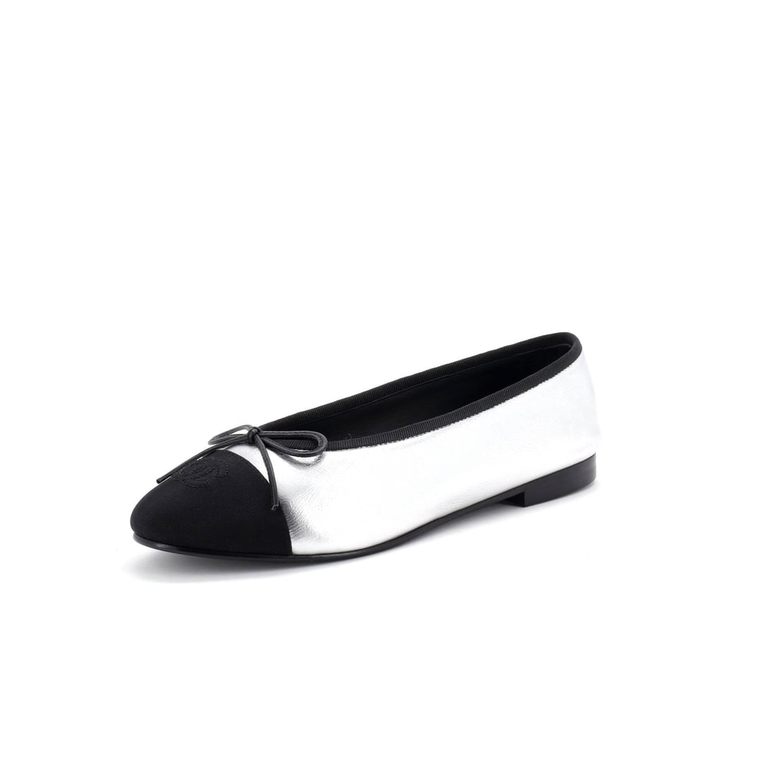 Chanel Women's CC Cap Toe Bow Ballerina Flats Leather with Grosgrain (US(W) 8 | IT 38): The Chanel Women's CC Cap Toe Bow Ballerina Flats in Leather with Grosgrain keeps the line of the foot visible while delivering the Chanel silhouette intact in size US(W) 8 | IT 38. Grosgrain is the r
