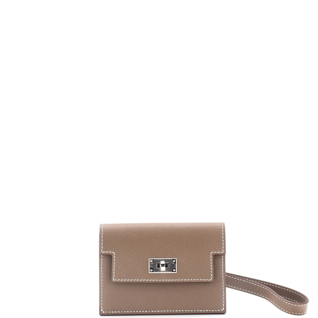 Hermes Kelly Pocket Slim Wristlet Wallet Madame (4.5"W x 3"H x 0.5"D): The Hermes Kelly Pocket Slim Wristlet Wallet in Madame translates the house's larger-bag architecture into a piece small enough to carry alongside it. Madame is among the more practical material choic