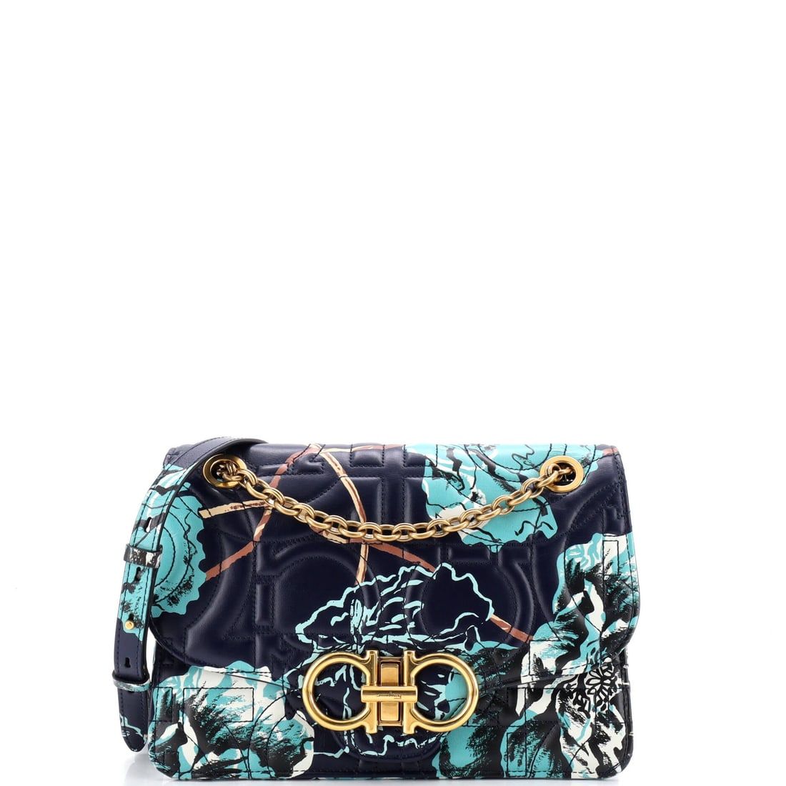 Salvatore Ferragamo Gancini Turnlock Flap Bag Gancini Quilted Printed Leather (Medium): At a 9.5 by 6.5 by 4 inch profile, the Salvatore Ferragamo Gancini Turnlock Flap Bag in Gancini Quilted Printed Leather offers the silhouette in its most photographed proportion. Gancini Quilted Print