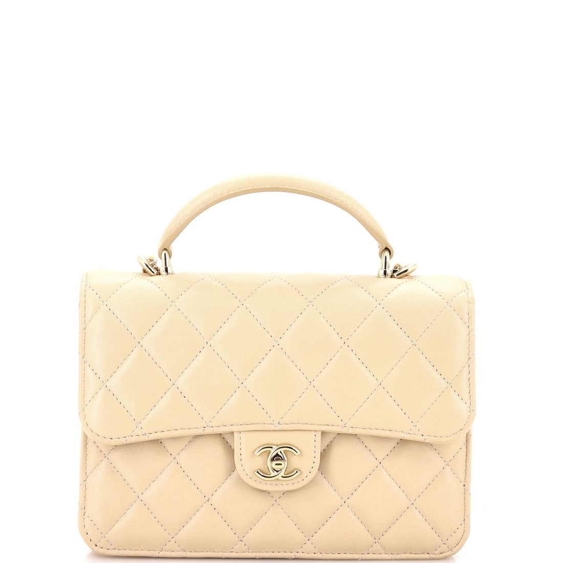 Chanel CC Top Handle Backpack Quilted Lambskin (Small): The Chanel CC Top Handle Backpack, here in Quilted Lambskin, in size Small, holds its shape against use rather than softening to it. Lambskin is the softer, more luminous of Chanel's two main leathers