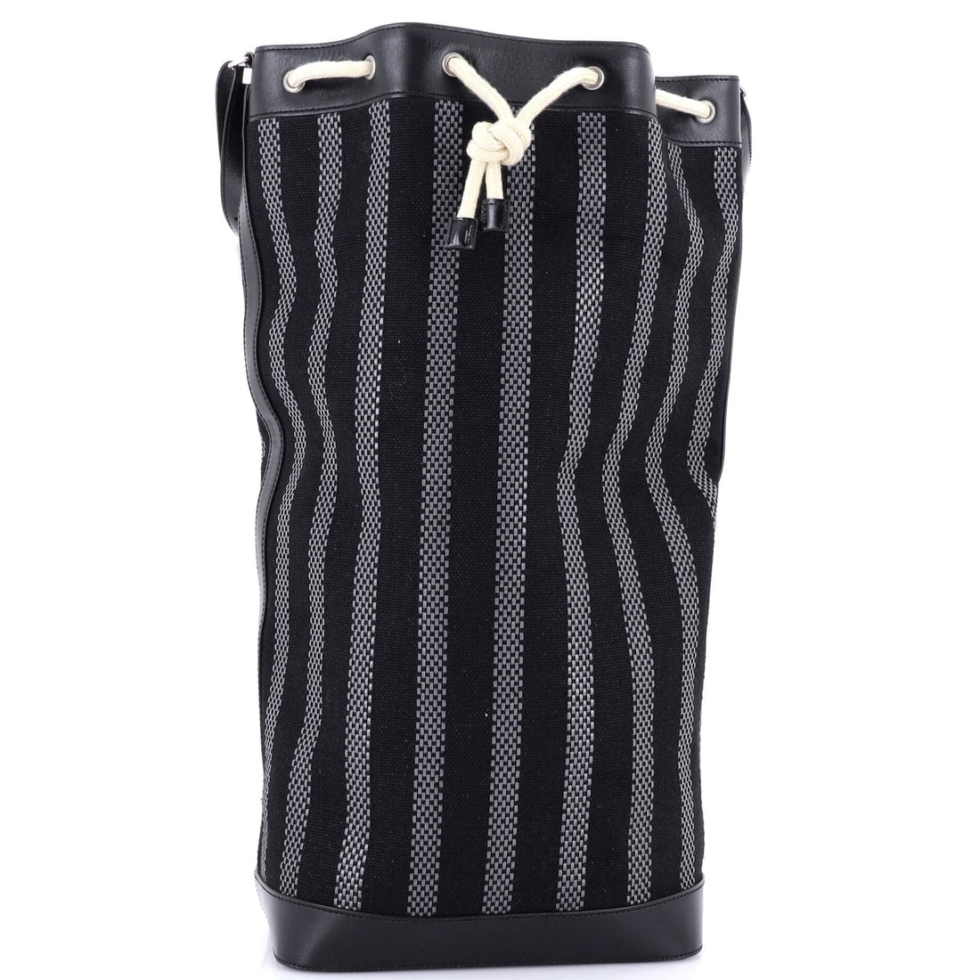 Saint Laurent Sport Bucket Bag Striped Canvas and Leather (10.5"W x 22"H x 7"D): The Saint Laurent Sport Bucket Bag in Striped Canvas and Leather is built to outlast the season it enters and the wardrobe it joins. The striped canvas and leather hand falls between the softer slouch