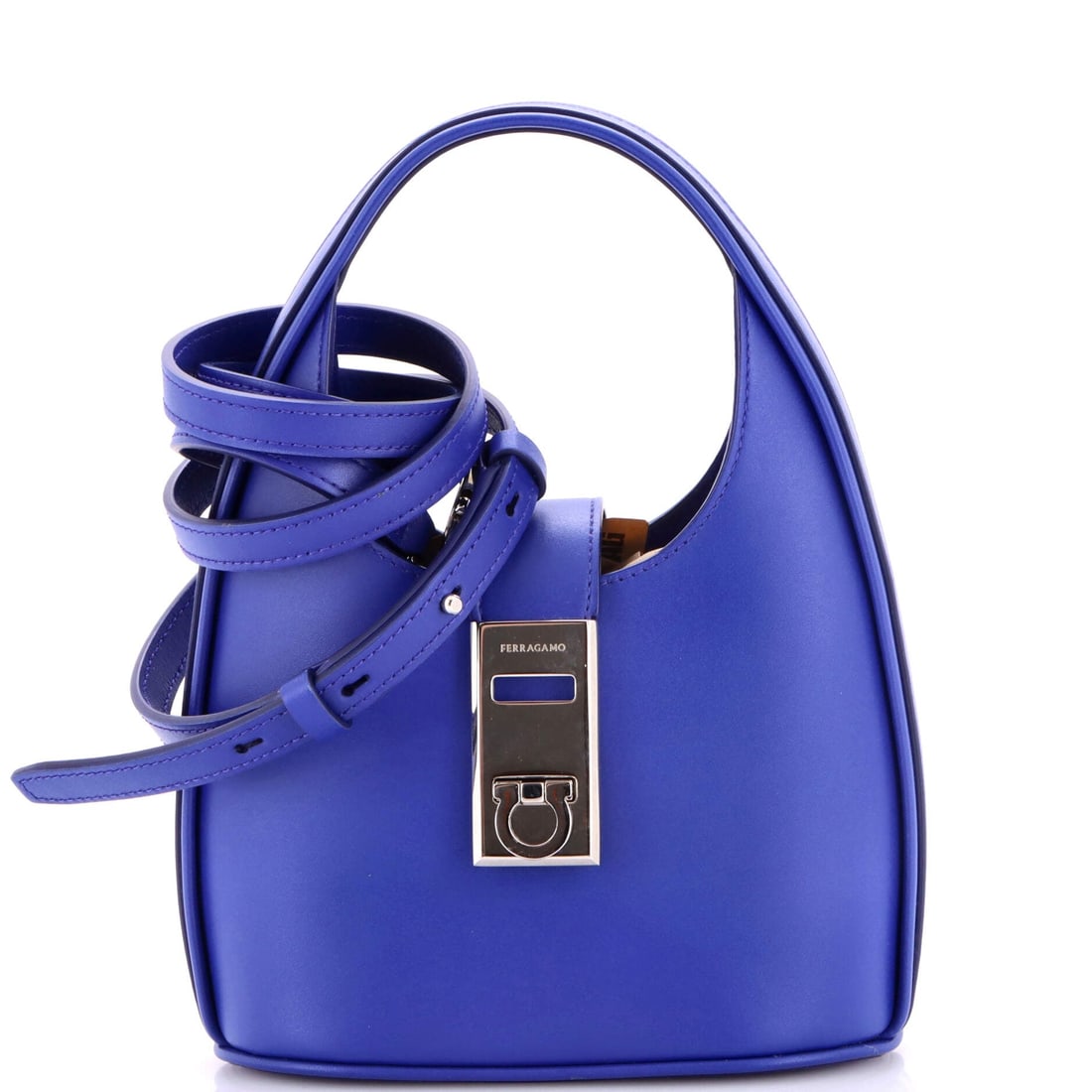 Salvatore Ferragamo Gancini Buckle Hobo Leather (Mini): The Salvatore Ferragamo Gancini Buckle Hobo in Leather is the model a wardrobe acquires after the obvious classics are already in place. Leather is among the more deliberate reads in the Salvatore Fer