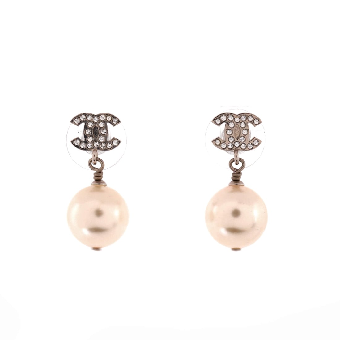 Chanel CC Pearl Drop Earrings Faux Pearl and Metal with Crystals (1 in H x 0.38 mm W): The Chanel CC Pearl Drop Earrings carries the faux pearl and metal with crystals treatment across 1 inch length. Faux Pearl and Metal with Crystals sits among the more wearable readings of the Chanel 