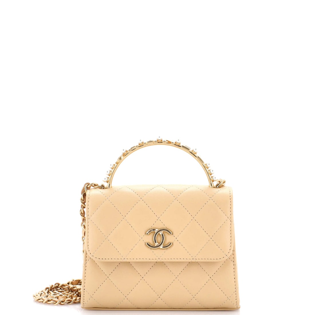 Chanel Logo and Pearl Top Handle Clutch with Chain Quilted Lambskin (Small): The Chanel Logo and Pearl Top Handle Clutch with Chain in Quilted Lambskin translates the model's architecture into a more saturated wardrobe register, in size Small. Lambskin is the softer, more lumi