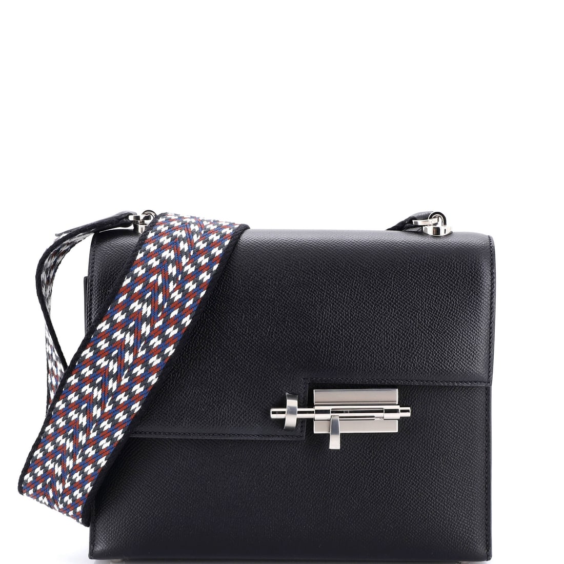Hermes Verrou Bag Epsom and Canvas (23): The Hermes Verrou Bag in Epsom and Canvas occupies the part of the Hermes catalogue that wardrobes return to season after season, at a 9 by 7 by 3 inch profile. Epsom is the finely embossed, structure