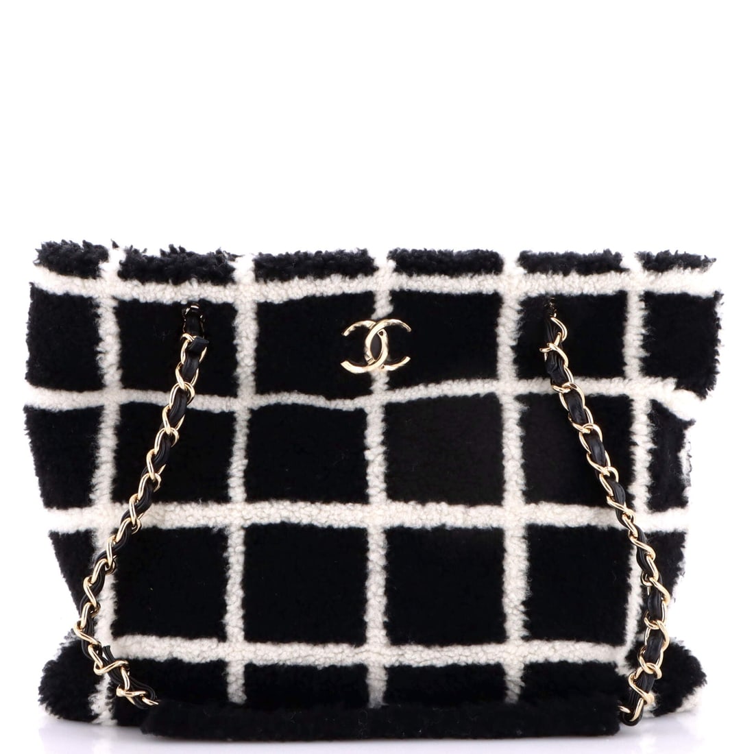 Chanel CC Chain Shopping Tote Square Printed Shearling (Large): The Chanel CC Chain Shopping Tote in Square Printed Shearling offers the silhouette at a scale built for serious wardrobe rotation, in size Large. Few materials in the Chanel library wear in as cleanl