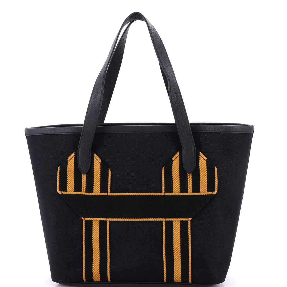 Hermes Pursangle Tote Canvas with Leather (12.5"W x 12"H x 7"D): The Hermes Pursangle Tote in Canvas with Leather is the model in its boutique-floor configuration, at a 12.5 by 12 by 7 inch profile. Sangle is Hermes's swap-strap line - shoulder straps designed to s