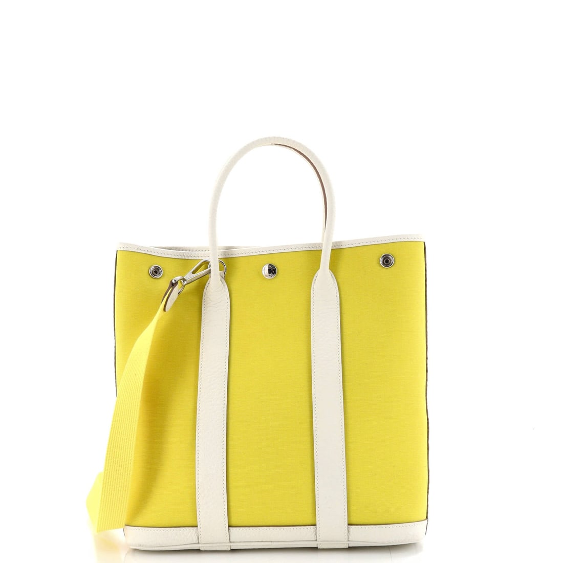 Hermes Garden File Tote Toile and Leather (28): The Hermes Garden File Tote in Toile and Leather is the carry the rest of the wardrobe quietly orbits around. Toile is the tightly woven cotton-and-linen canvas Hermes runs on travel and dustbag piece