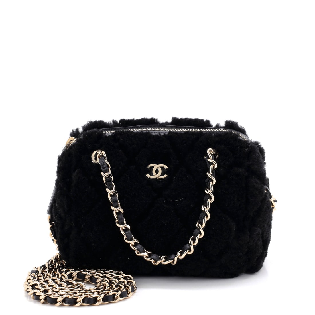 Chanel CC Double Chain Zip Clutch with Chain Quilted Shearling (Mini): The Chanel CC Double Chain Zip Clutch with Chain in Quilted Shearling is one of the more deliberate silhouettes in the house's continuing production, in size Mini. Quilted Shearling is among the more 