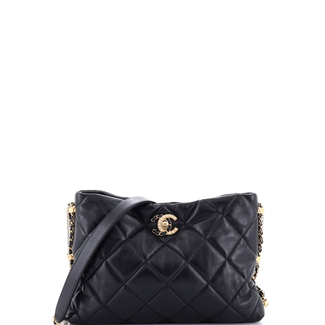 Chanel Crush on Chains Hobo Quilted Lambskin (10"W x 7"H x 1.5"D): The Chanel Crush on Chains Hobo in Quilted Lambskin is the model a wardrobe acquires after the obvious classics are already in place. Lambskin is the softer, more luminous of Chanel's two main leather