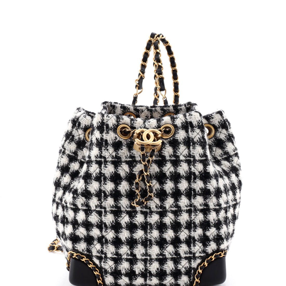 Chanel Chained Drawstring CC Bucket Backpack Quilted Houndstooth Tweed (Small): The Chanel Chained Drawstring CC Bucket Backpack in Quilted Houndstooth Tweed sits cleanly between daytime utility and evening polish, in size Small. Tweed - Chanel's signature woven cloth, run since 