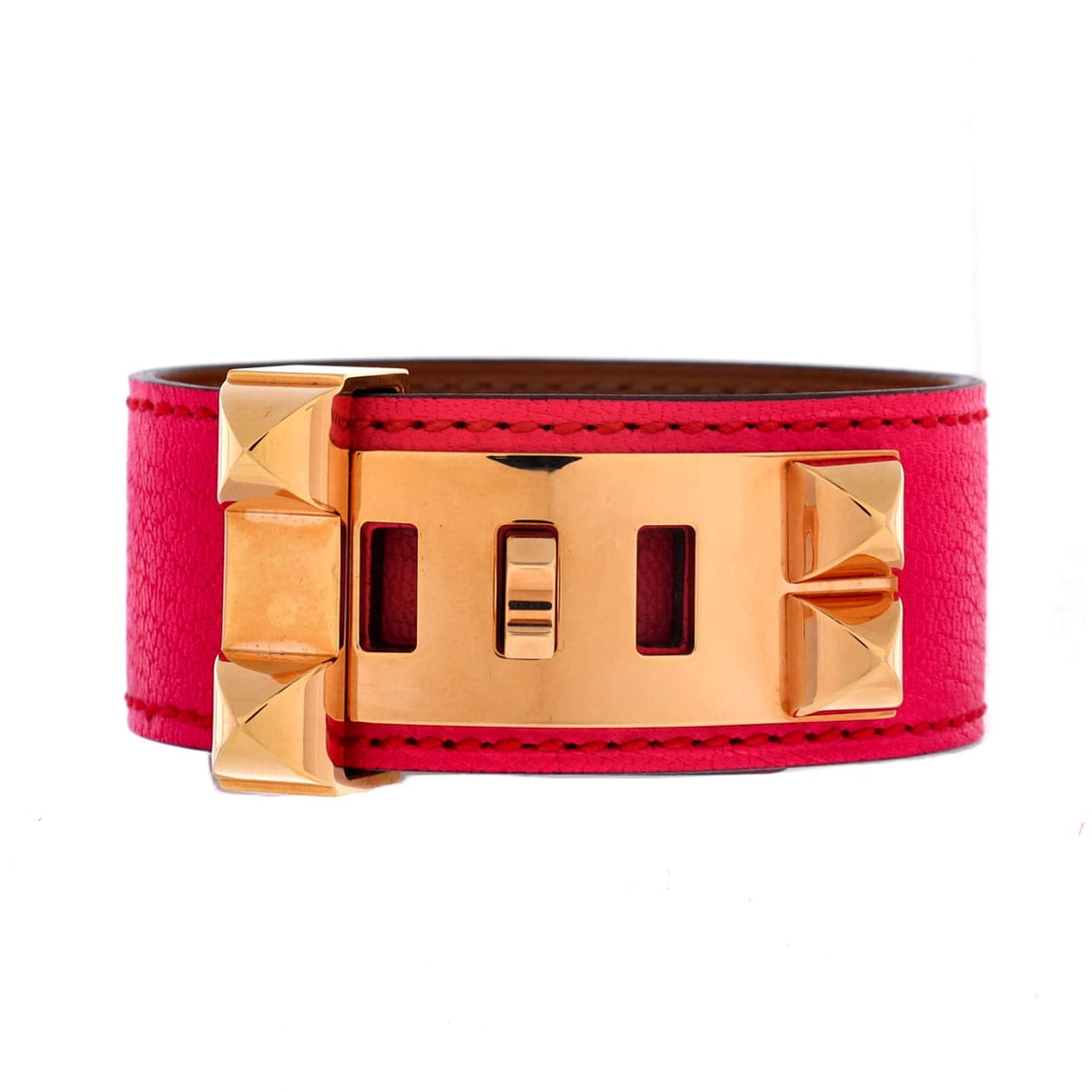 Hermes Collier de Chien 24 Bracelet Leather (Circumference 6.25 in): The Hermes Collier de Chien 24 Bracelet in Leather sits at the wearable end of the Hermes catalogue without losing its formal authority. The metalwork sits as cleanly against bare skin as it does agai