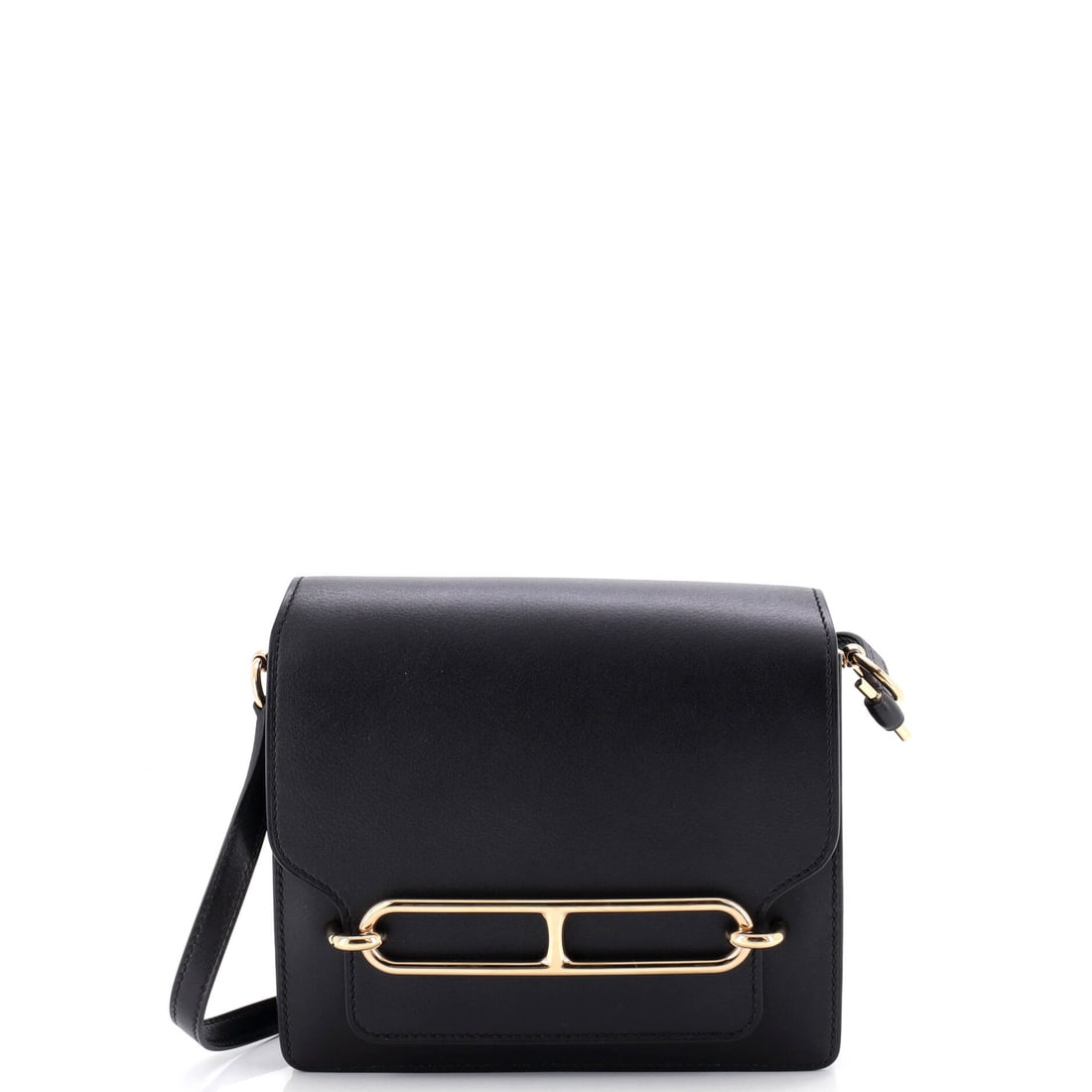 Hermes Roulis Bag Swift (18): The Hermes Roulis Bag in Swift closes cleanly at the front, a small architectural moment that signals the model from across the room. Swift is Hermes's fine, smooth calfskin, light in the hand and the